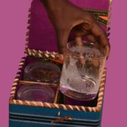 engraved Whiskey glasses being packed in maasai banana fiber box